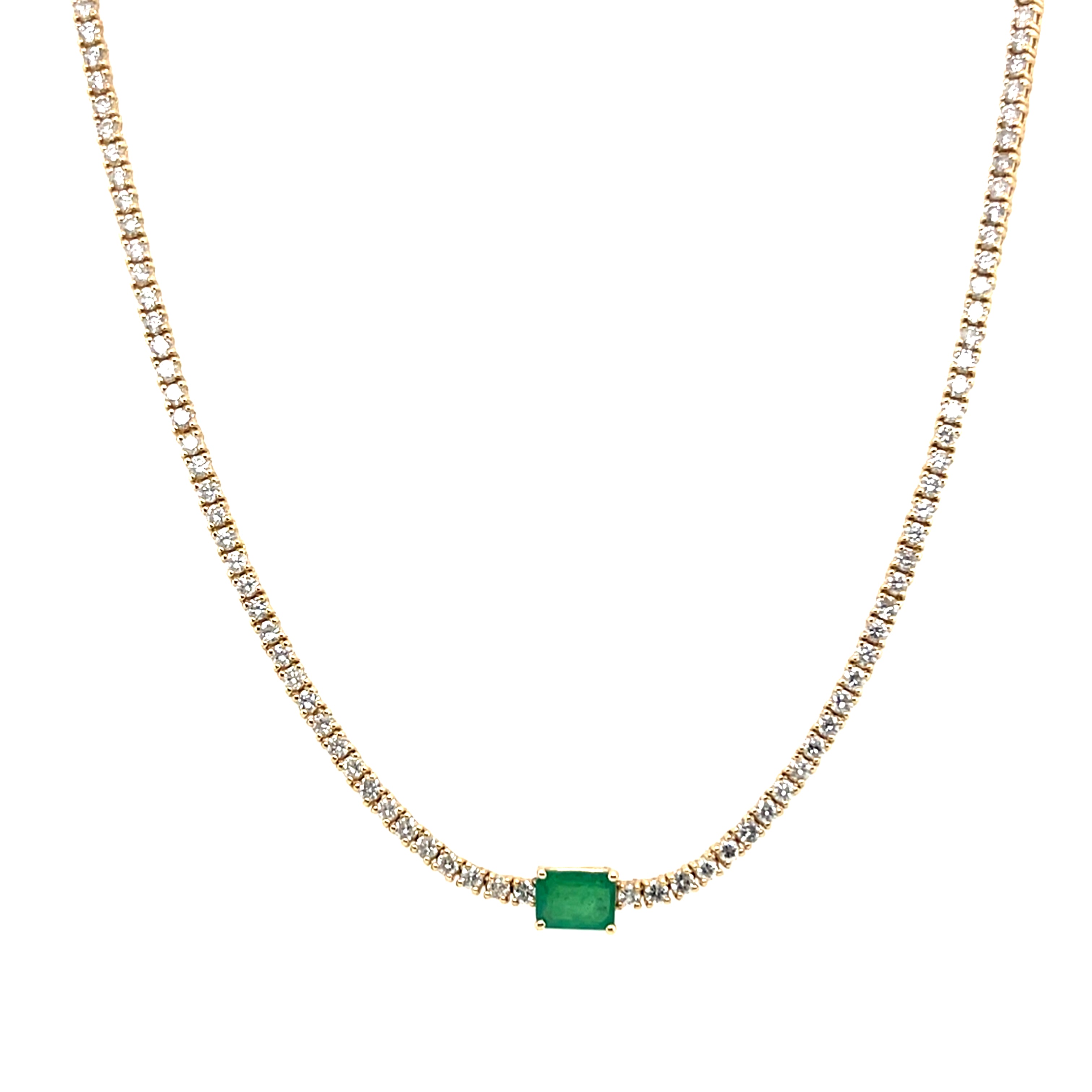 Tennis necklace with emerald centerpiece
